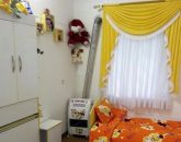 اتاق خواب با پرده زرد